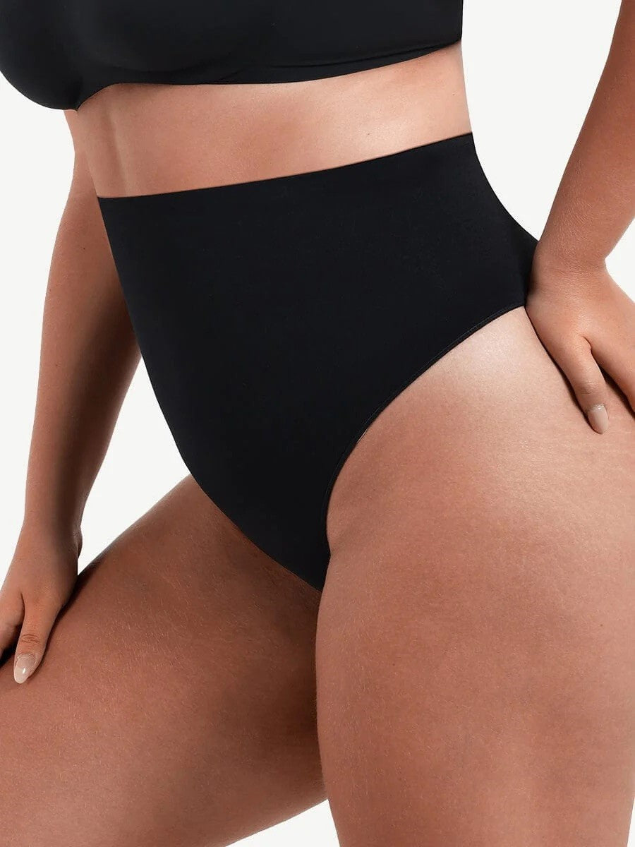 A black, high-waisted shaping waist underpants with a smooth, second-skin appearance and slimming design.